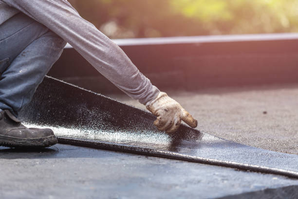 Professional Basement Waterproofing technician working in Islip Terrace, NY